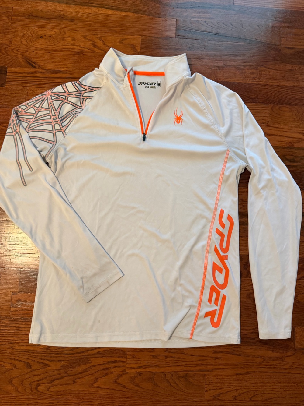 Spyder Men’s White Long-Sleeve Performance Top with Orange Logo